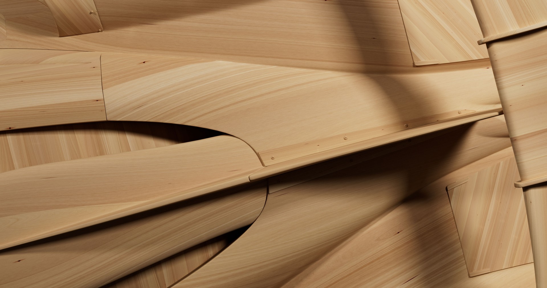 A close-up shot showcasing the front of a wooden sports car